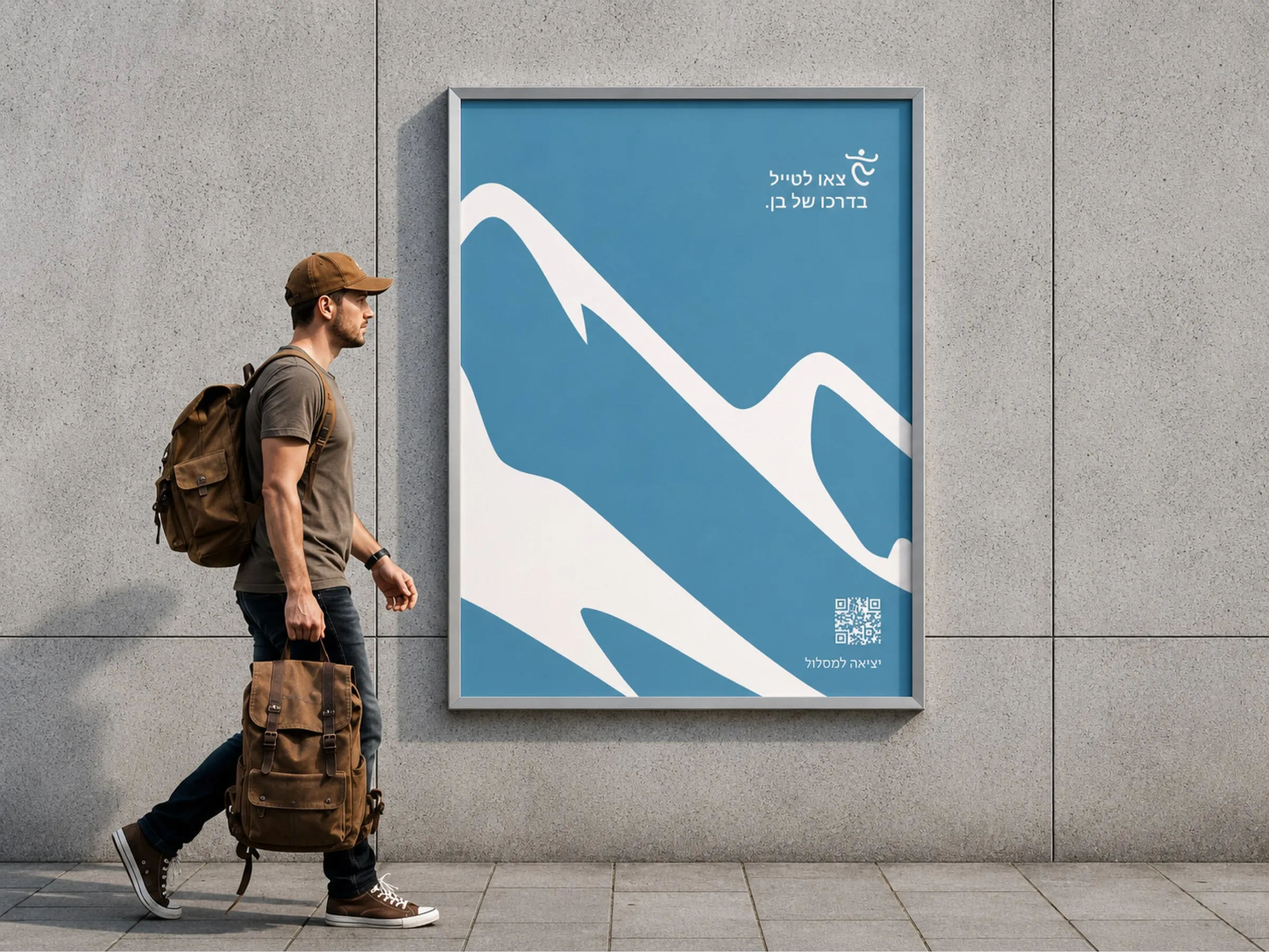 A Ben’s Way poster on a concrete wall, a white mountain shape on blue, a hiker with a backpack walking past it